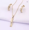 Set di gioielli in acciaio inossidabile dorato con orecchini e collana con strass a forma di X