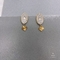 Collana e orecchini in oro 14k CE con gioielli in acciaio SS con quadrifoglio