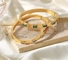 Oro del braccialetto del braccialetto di amicizia di amore di 18 K con il regalo provvisto di cardini pietre di zircone