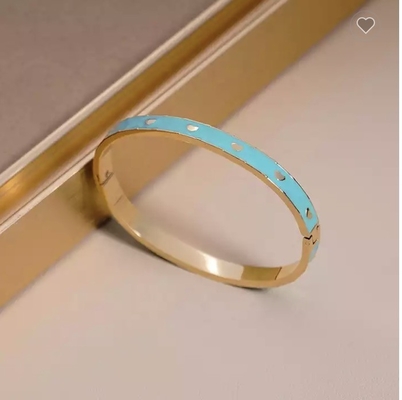 Le marche di lusso hanno smaltato il braccialetto blu di acciaio inossidabile dell'oro del braccialetto 24k del fermaglio di amore