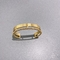Bracciale in acciaio inossidabile con doppio anello di design esclusivo. Bracciale rigido in oro 18 carati